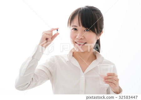 Drinking women, taking, drinking medicine Drinking women, taking, drinking medicine 32583447