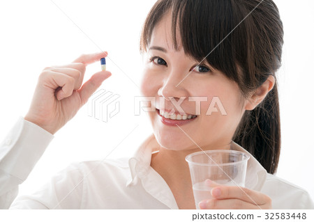 Drinking women, taking, drinking medicine Drinking women, taking, drinking medicine 32583448