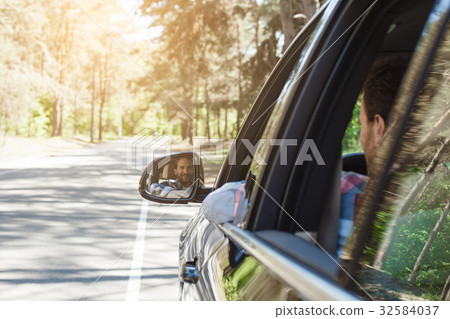 Travel by car family trip together vacation Travel by car family trip together vacation 32584037