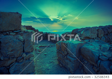 Beautiful sunrise over Masada fortress 32586343
