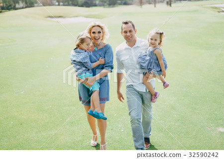 young family on the street young family on the street 32590242