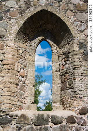 View through a window of an old castle at Sigulda View through a window of an old castle at Sigulda 32590596