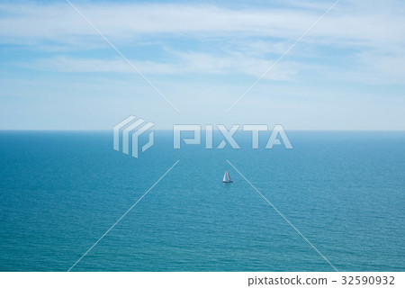 A lonely sailing ship in the water A lonely sailing ship in the water 32590932