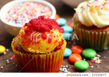 cupcake and chocolate coated colorful cupcake and chocolate coated colorful 32593677