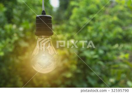 Hanging light bulbs with glowing one. Hanging light bulbs with glowing one. 32595790