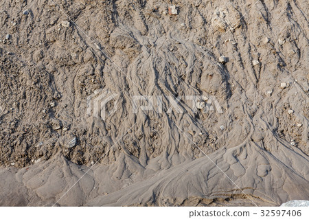 Small mud slide after rain Small mud slide after rain 32597406