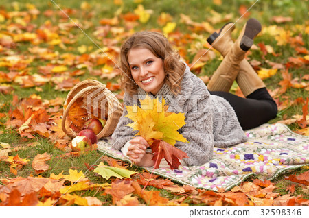 young woman resting in park young woman resting in park 32598346