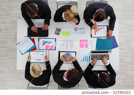 Business people work with statistics 32599101