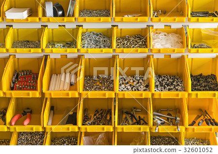 Plastic yellow boxes with instruments on wall Plastic yellow boxes with instruments on wall 32601052