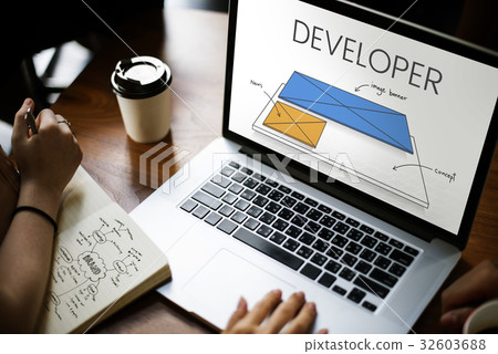 Hands working on laptop network graphic overlay 32603688