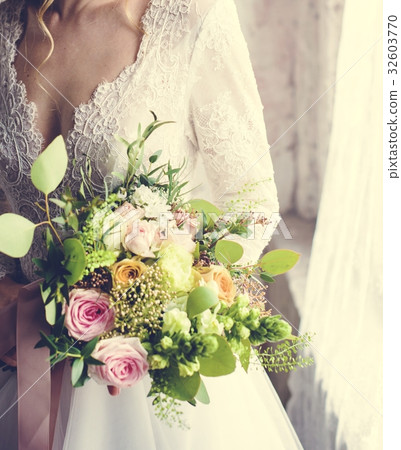 Attractive Beautiful Bride Holding Flowers Bouquet 32603770