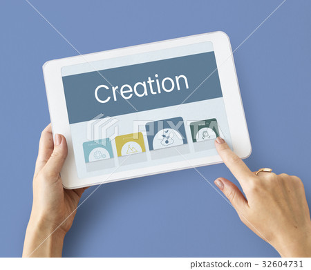 Hands working on digital device network graphic overlay Hands working on digital device network graphic overlay 32604731