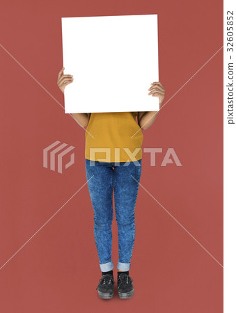 Covered Face Girl Standing and Holding Empty Placard 32605852