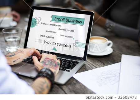 Hands working on laptop network graphic overlay 32608478