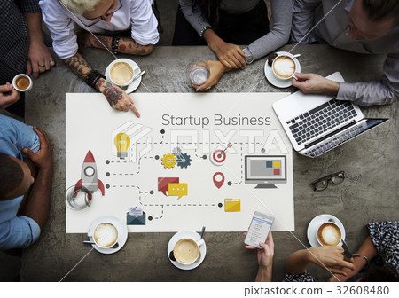 Workers working on banner network graphic overlay on table 32608480