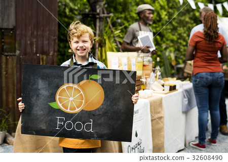 Boy with Illustration of fresh organic orange Boy with Illustration of fresh organic orange 32608490