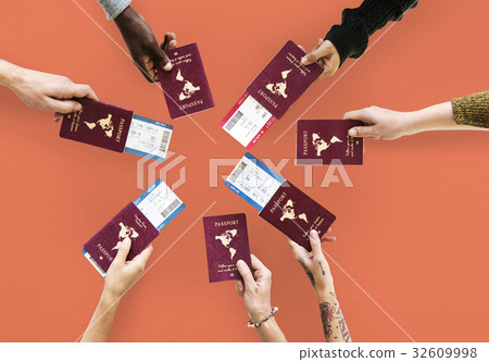 Group of hands holding passport in aerial view Group of hands holding passport in aerial view 32609998