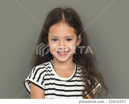 Little girl smiling casual studio portrait 32610352