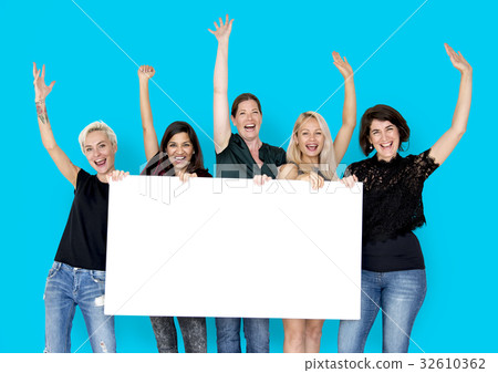 Happiness group of women arms raised and holding blank banner Happiness group of women arms raised and holding blank banner 32610362