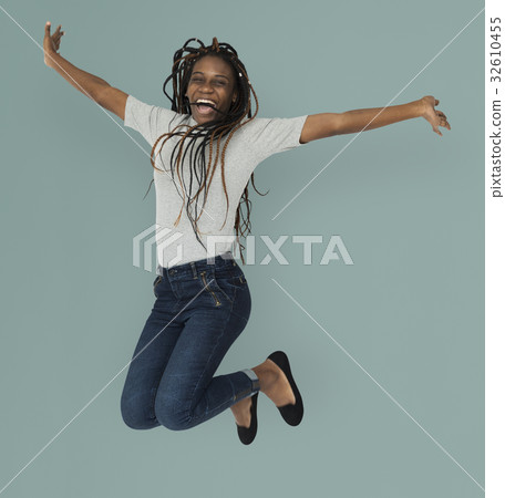 African woman jumping active smiling 32610455