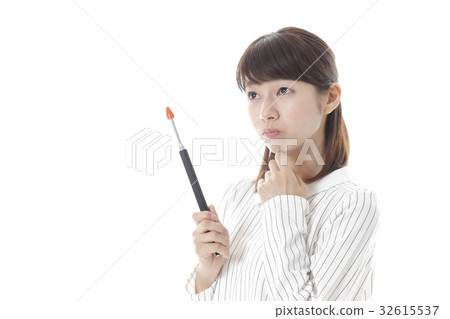 A woman with a stick 32615537