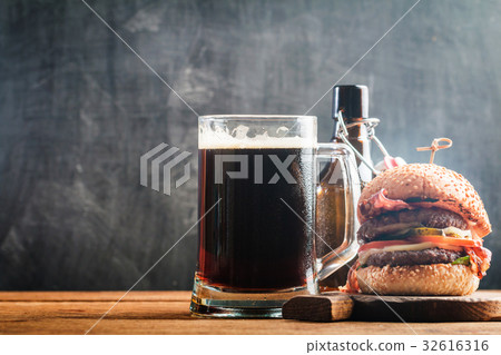 Glass of dark beer Glass of dark beer 32616316