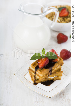 Waffles with strawberries and chocolate Waffles with strawberries and chocolate 32616353