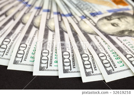 One hundred dollar bills, shallow depth of field One hundred dollar bills, shallow depth of field 32619258