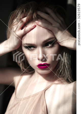 Portrait of beautiful girl model with pink lips 32619579