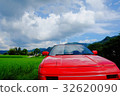 Red sports car and summer sky Red sports car and summer sky 32620090