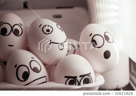 Concept of gossip. Face eggs are funny in fridge Concept of gossip. Face eggs are funny in fridge 32621029