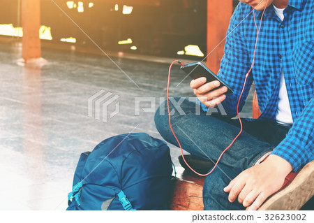 Asian young smart man hand holding mobile phone Asian young smart man hand holding mobile phone 32623002