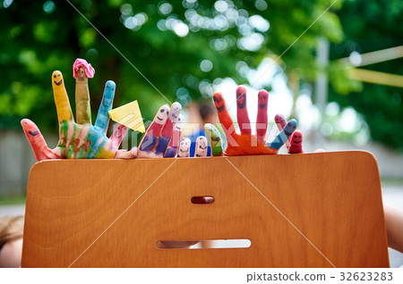 Childrens multicolored paints colored fingers Childrens multicolored paints colored fingers 32623283
