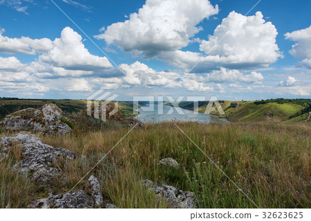 River canyon with green hills River canyon with green hills 32623625