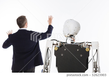 Imaginative brilliant man employing innovative Imaginative brilliant man employing innovative 32623903