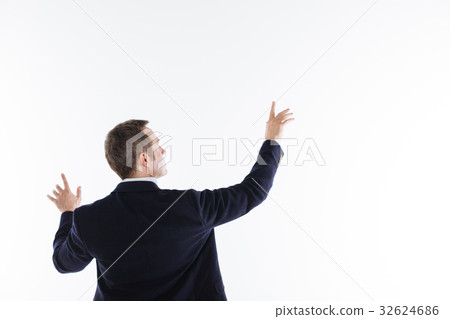 Excited precise gentleman holding his hands up 32624686