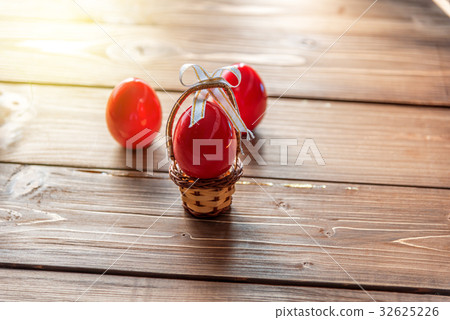 Easter eggs on a wooden background Easter eggs on a wooden background 32625226