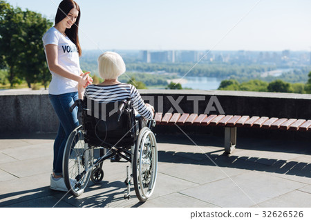 Stunning volunteer encouraging senior woman living Stunning volunteer encouraging senior woman living 32626526