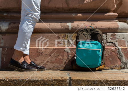 Young man resting outdoor during his tour 32627842