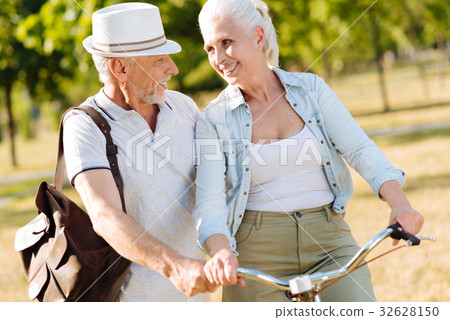 Charming blonde smiling to her husband Charming blonde smiling to her husband 32628150