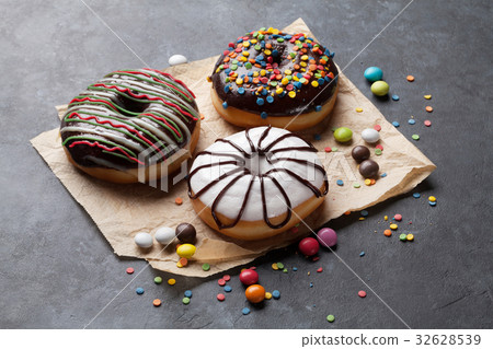 Colorful donuts and candies 32628539