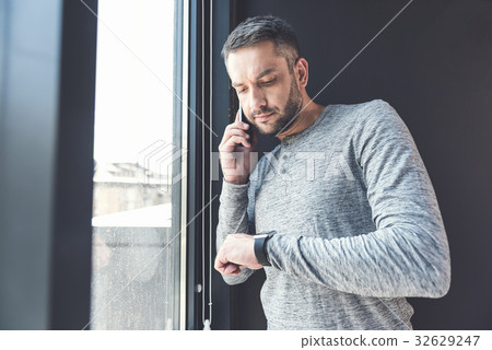 Successful pleasant businessman is having Successful pleasant businessman is having 32629247