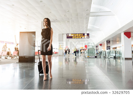 Cheerful attractive business lady is walking to 32629705