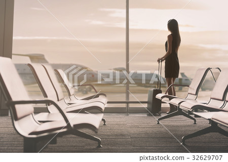 Elegant lady is waiting for flight 32629707