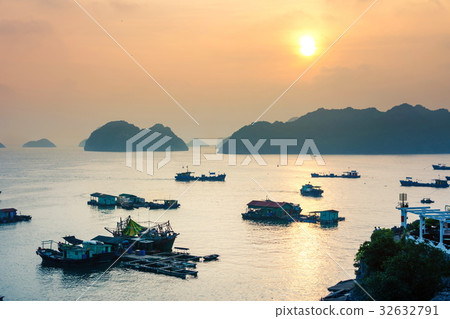 Sunset over boats of Cat ba island in Vietnam Sunset over boats of Cat ba island in Vietnam 32632791