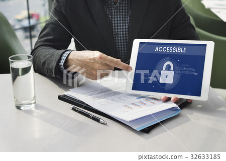Hands working on digital device network graphic overlay Hands working on digital device network graphic overlay 32633185