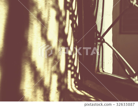 Sunny light in the morning with iron bars 32633887