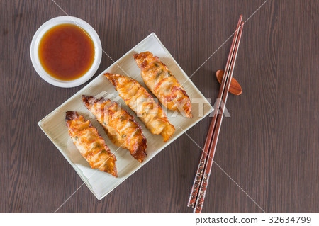 plate of Japanese gyoza, dumplings with soy sauce plate of Japanese gyoza, dumplings with soy sauce 32634799