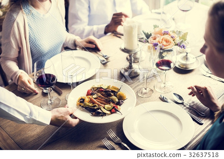 Restaurant Staff Serving Food Main Dish to Customers 32637518