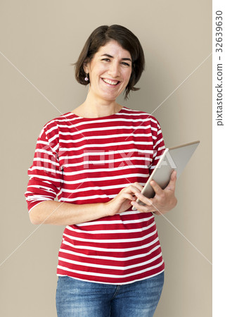 Adult Woman Using Digital Tablet Studio Adult Woman Using Digital Tablet Studio 32639630